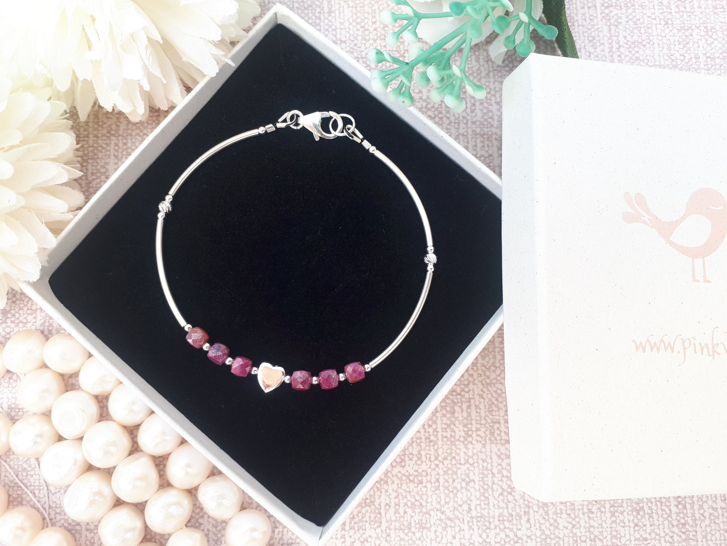 Personalised ruby bracelet in sterling silver.