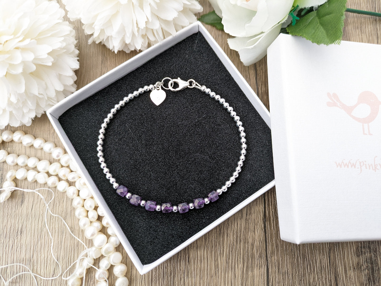 Amethyst milestone bracelet in sterling silver.