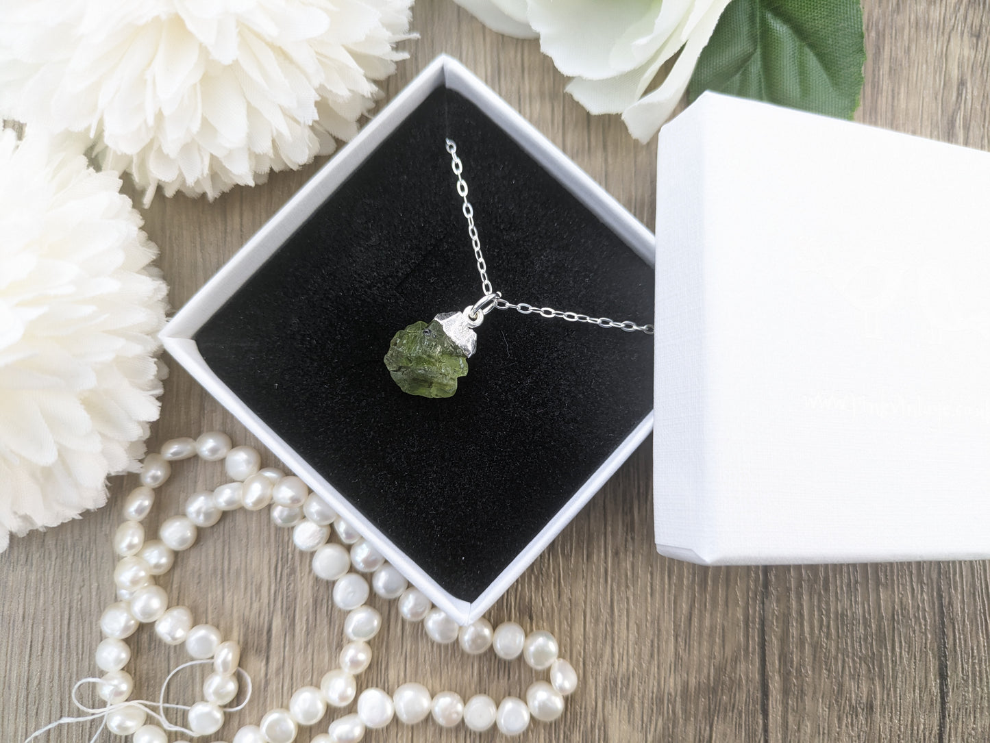 Raw peridot necklace in silver. August birthstone.