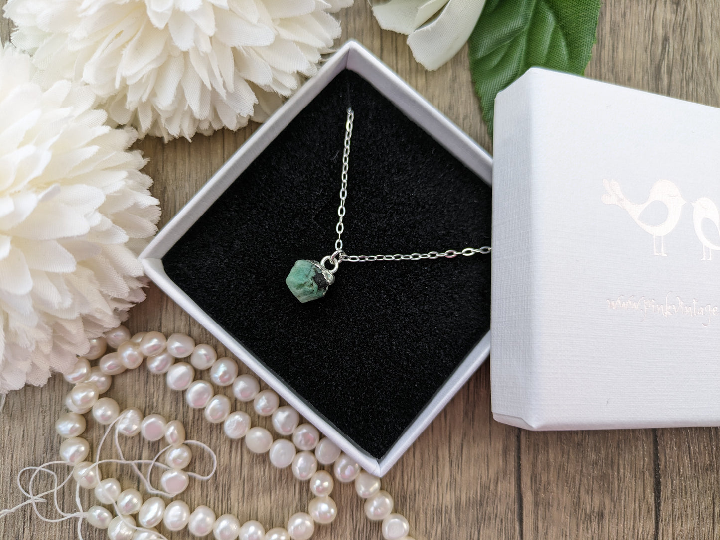 Raw emerald necklace. May birthstone necklace.