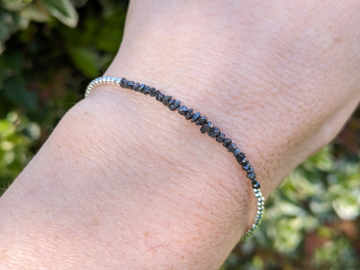 Raw black diamond bracelet in silver or gold.