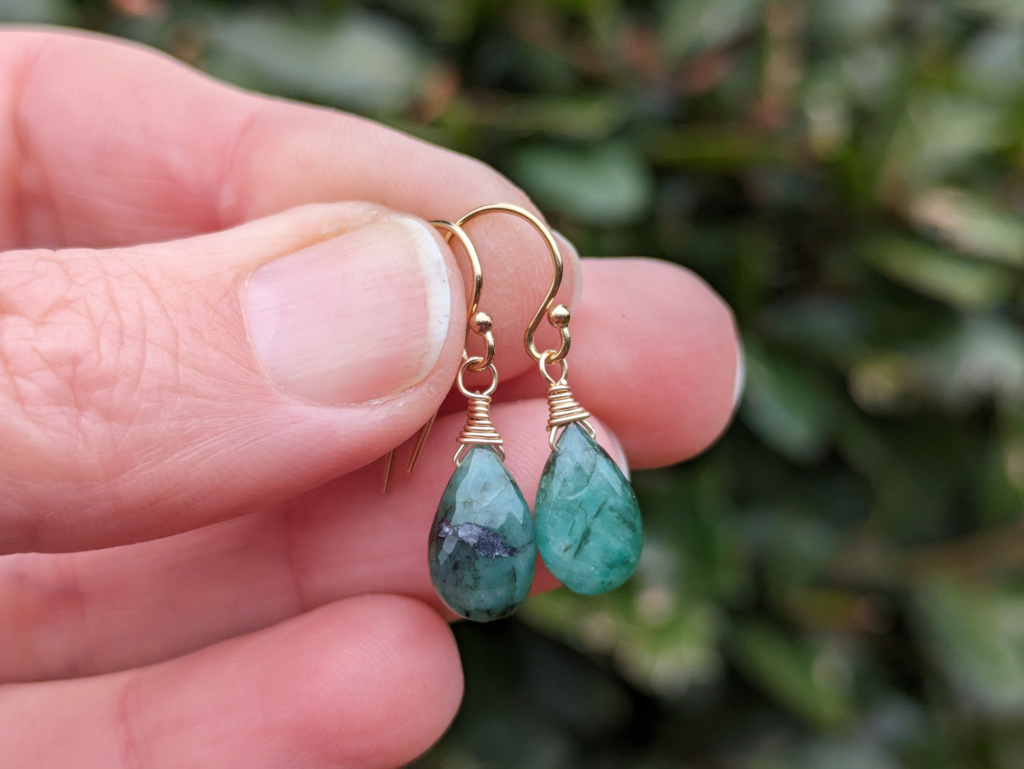 May birthstone earrings.