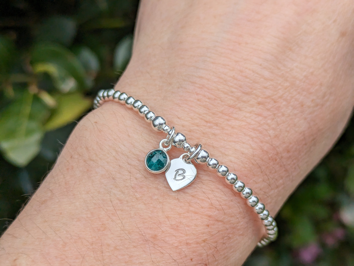 Emerald initial bracelet. May birthstone bracelet.