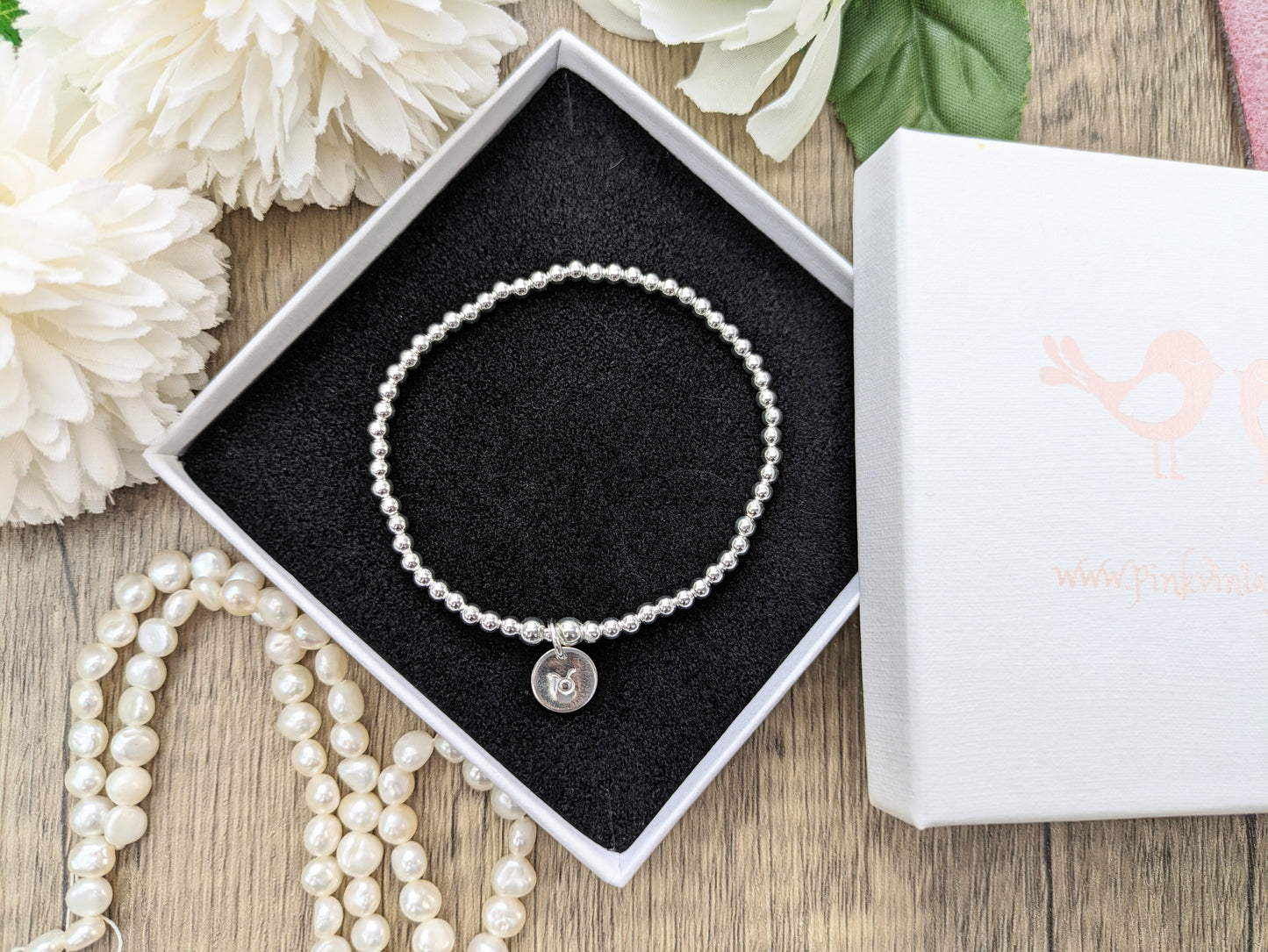Zodiac stretch bracelet.