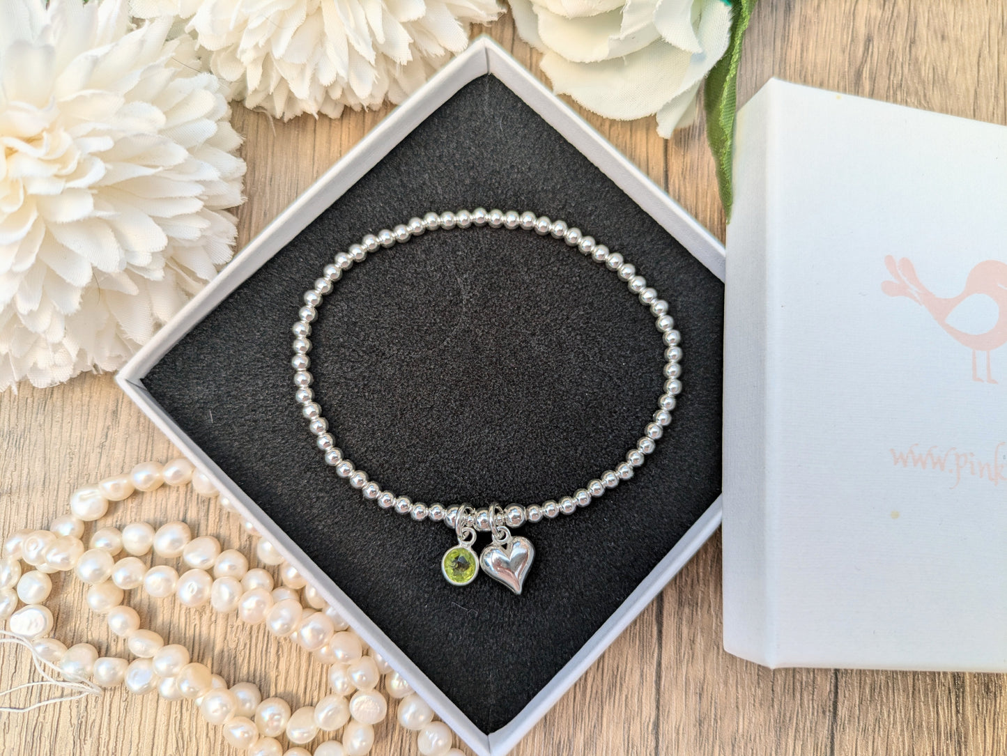 August birthstone charm bracelet.