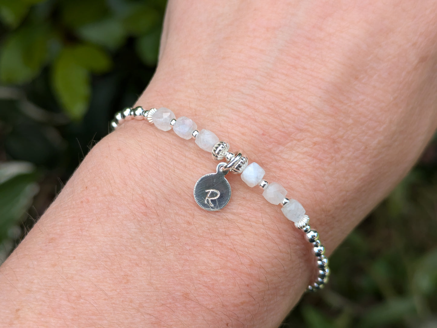 Rainbow moonstone initial bracelet.