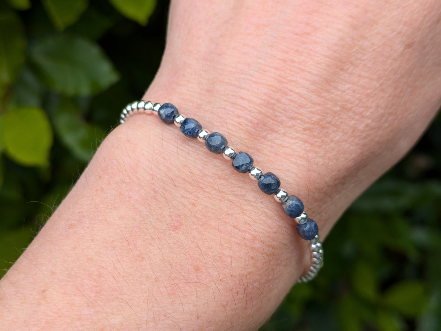 Sapphire milestone bracelet in sterling silver.