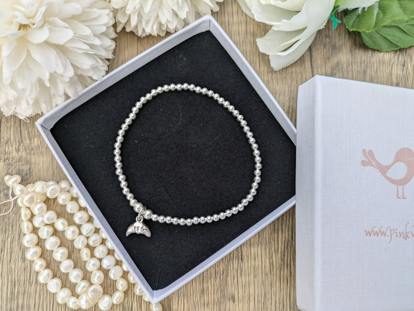 Croissant charm bracelet.