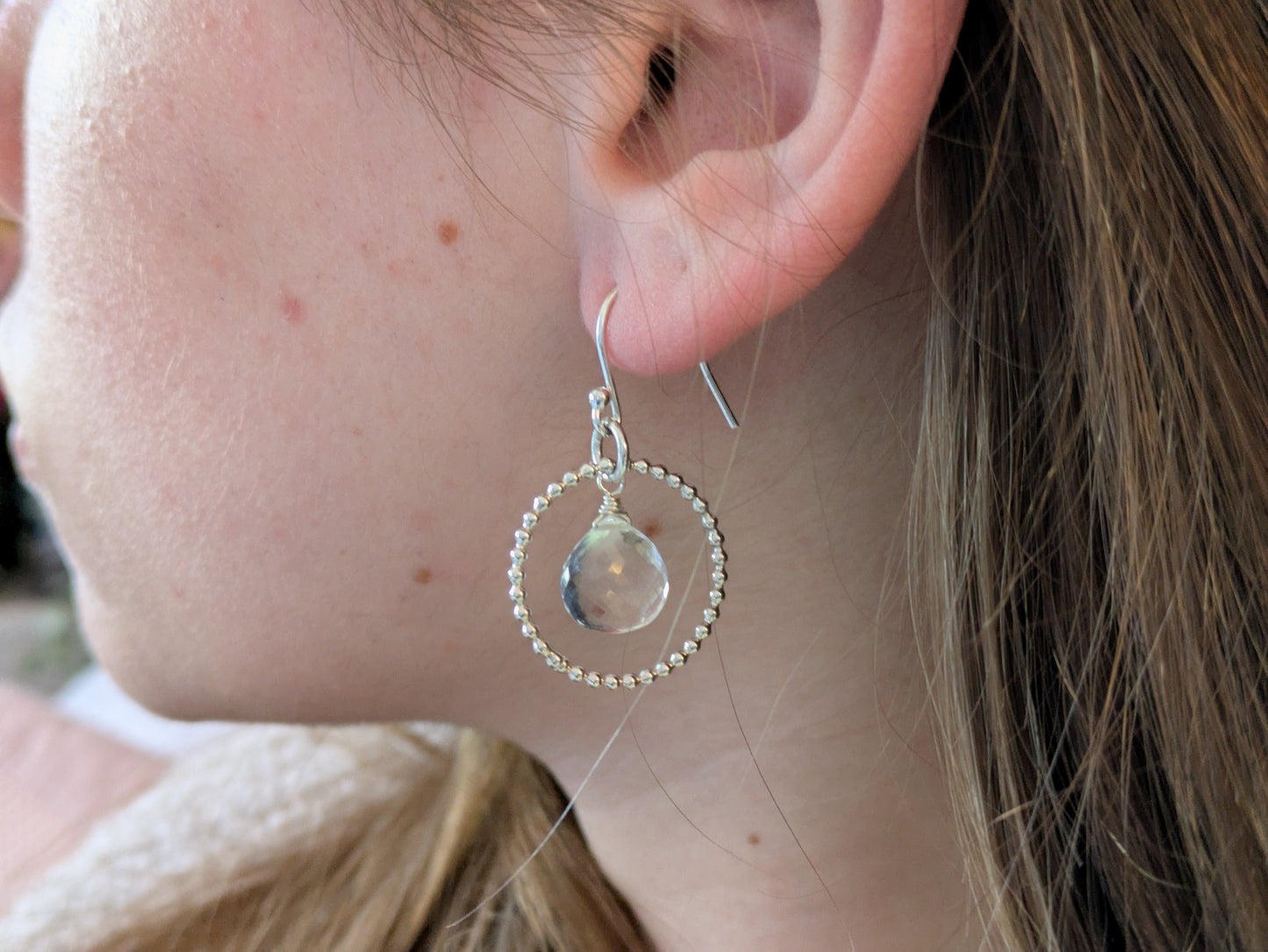 Crystal quartz April birthstone earrings.