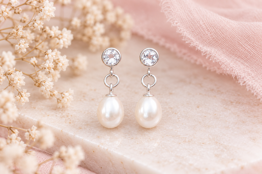 Aquamarine and pearl drop earrings.