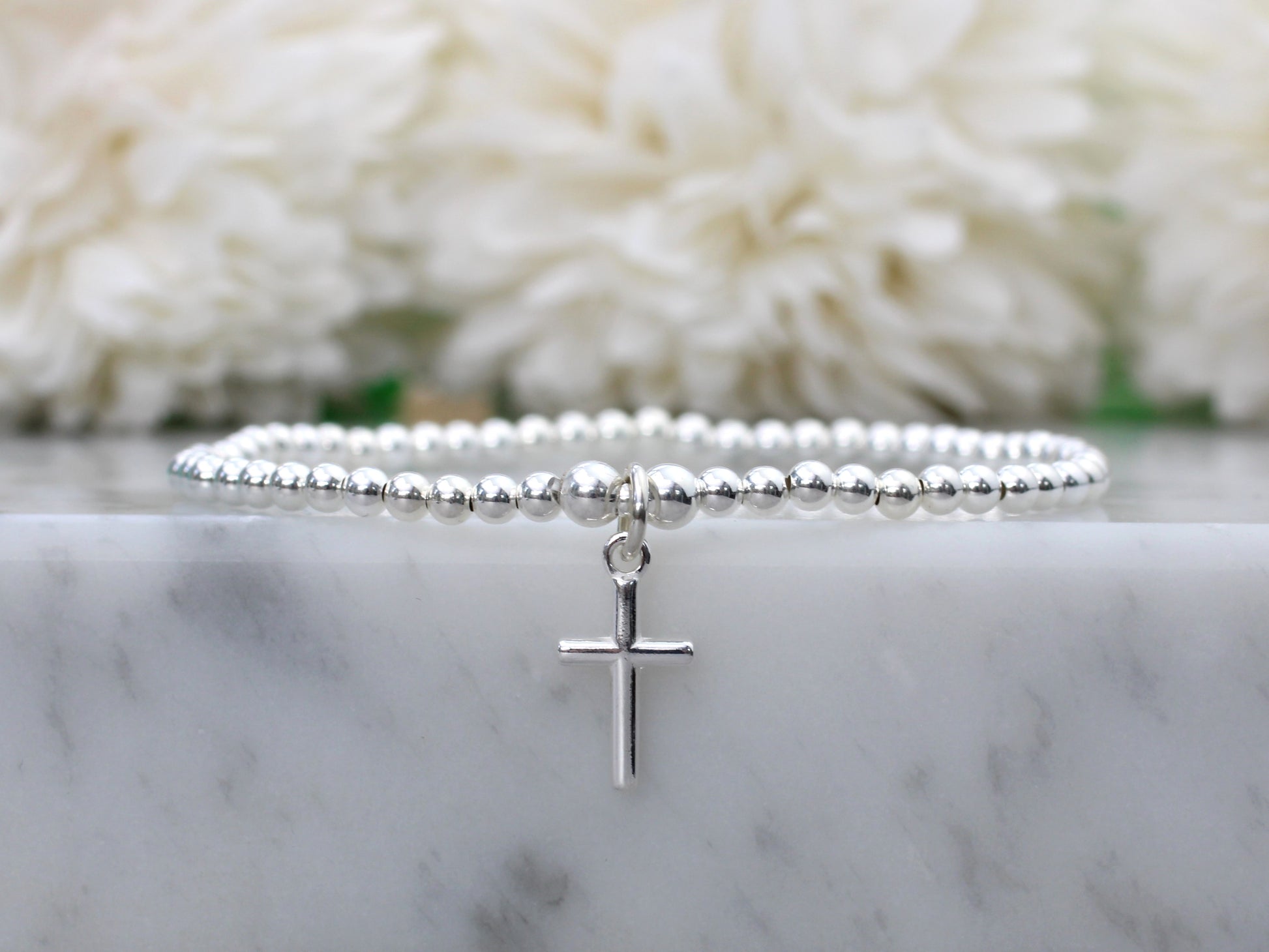 silver cross bracelet