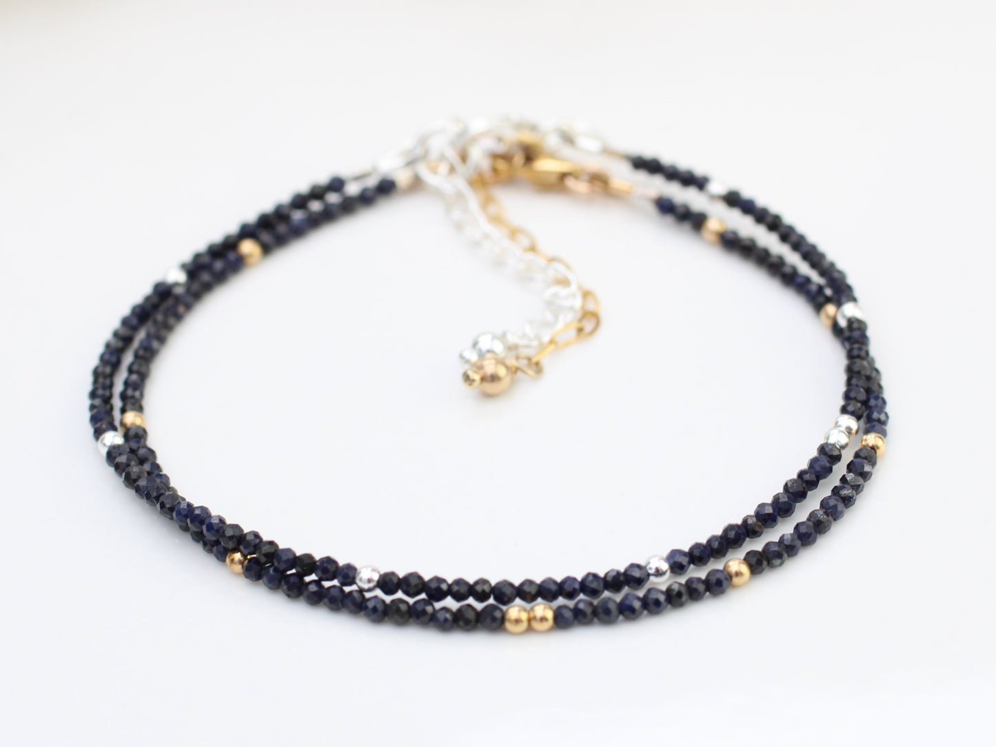 Skinny sapphire bracelet in sterling silver or gold.