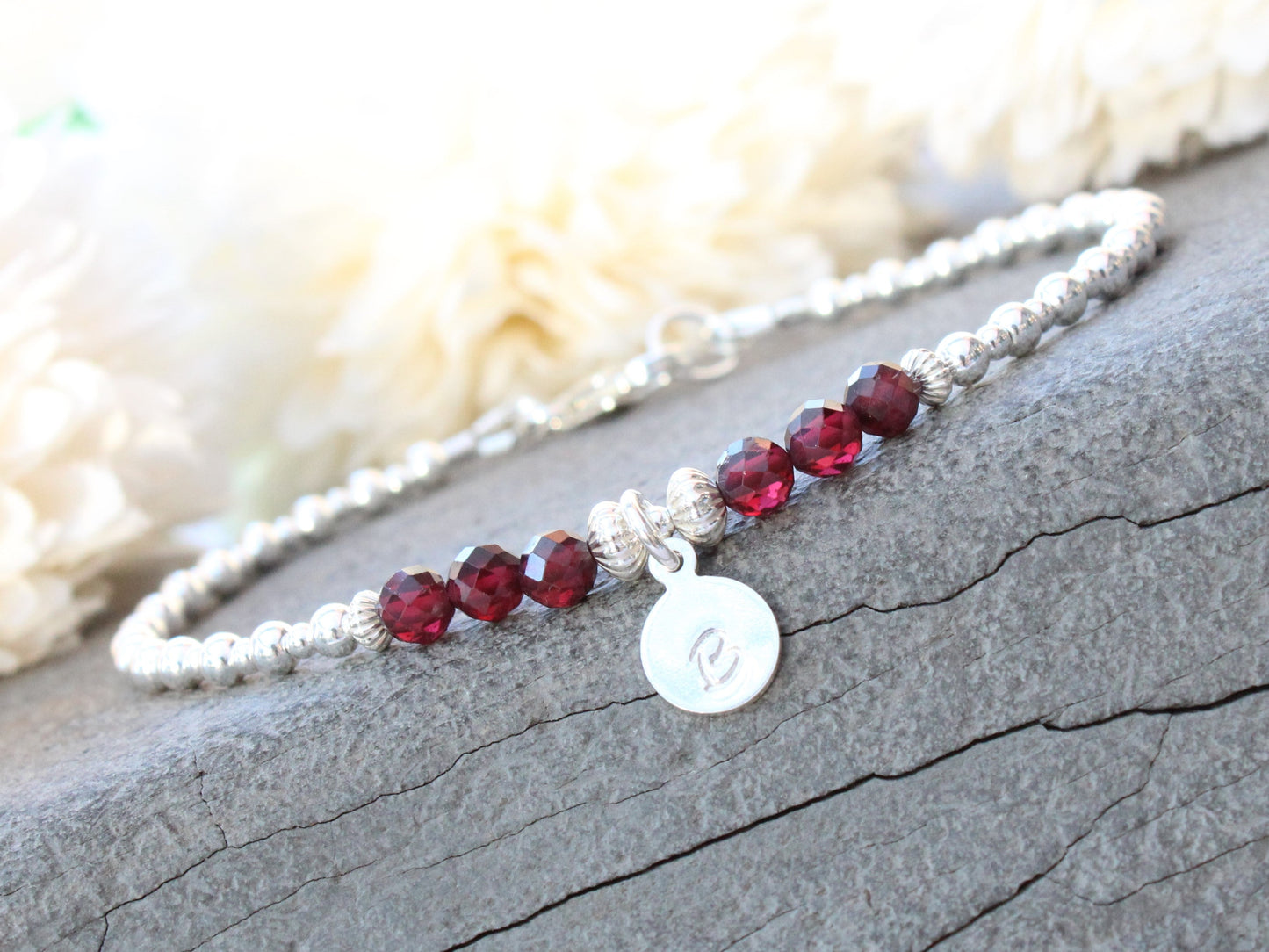 Initial and birthstone bracelet.