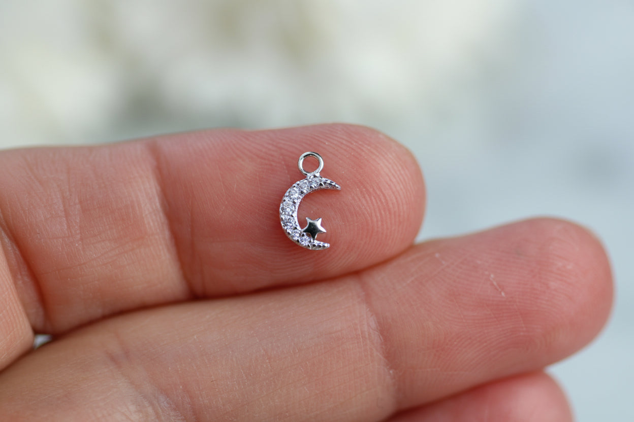 Sparkly moon and star charm.