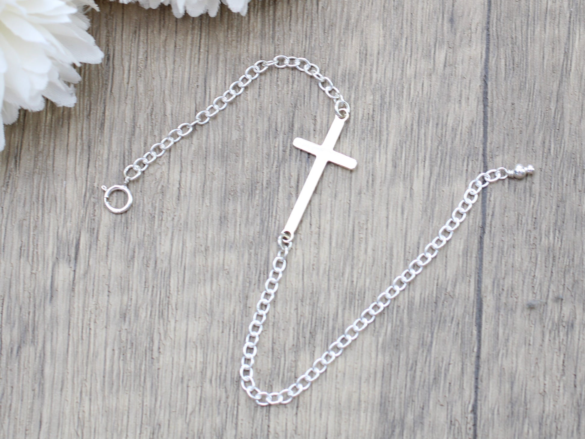 adjustable sideways cross bracelet
