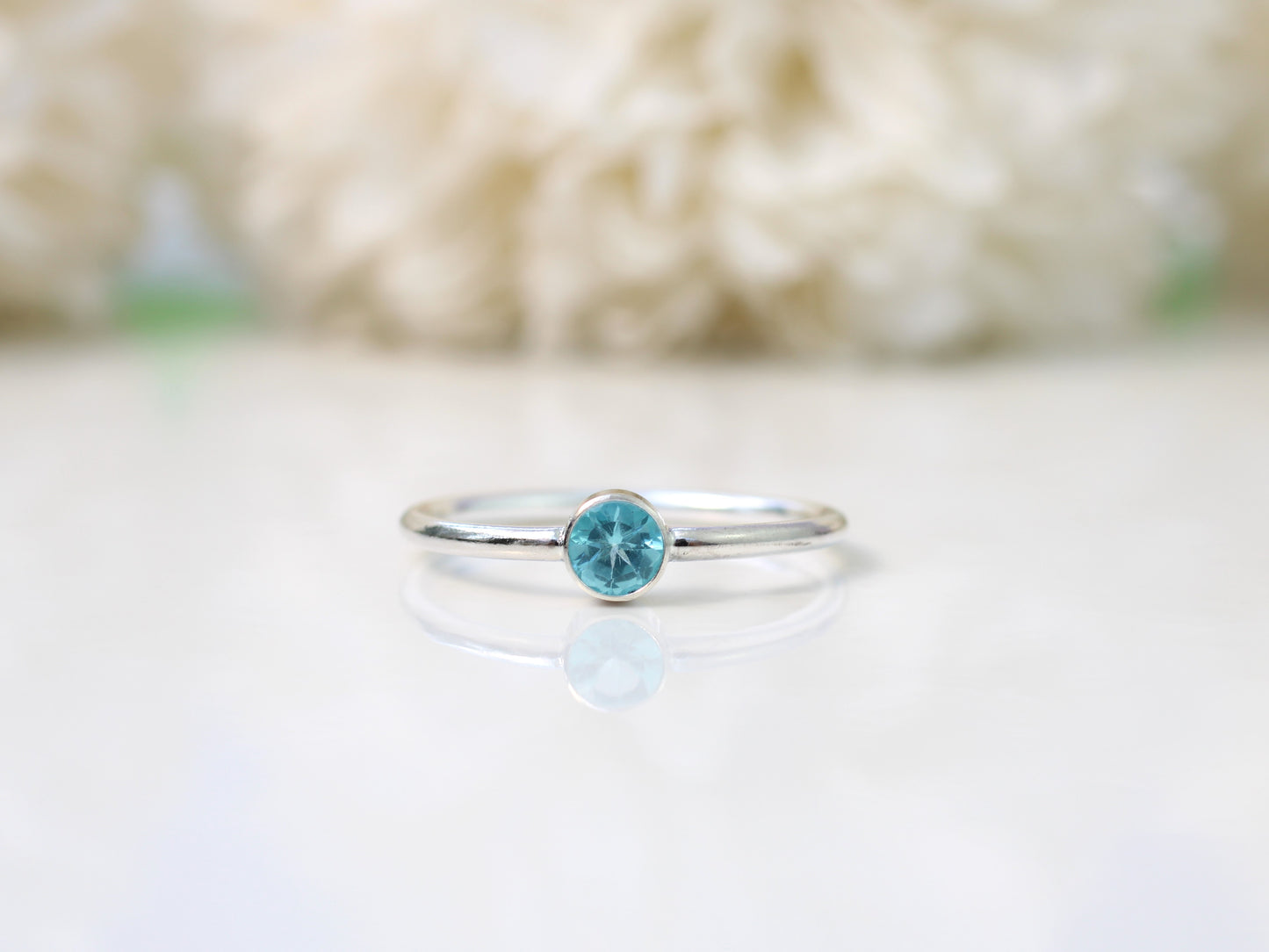 Apatite ring in sterling silver or gold.