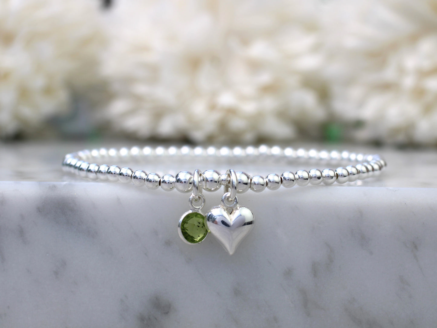 august birthstone charm bracelet