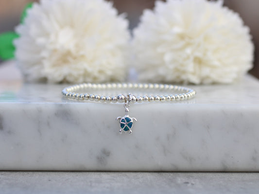 Blue opal turtle charm bracelet.
