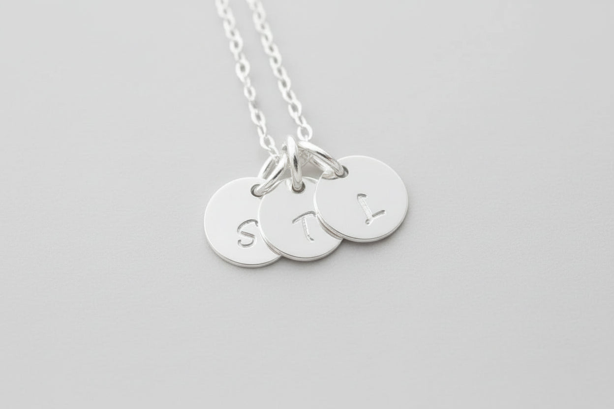 Create your own family initial necklace.