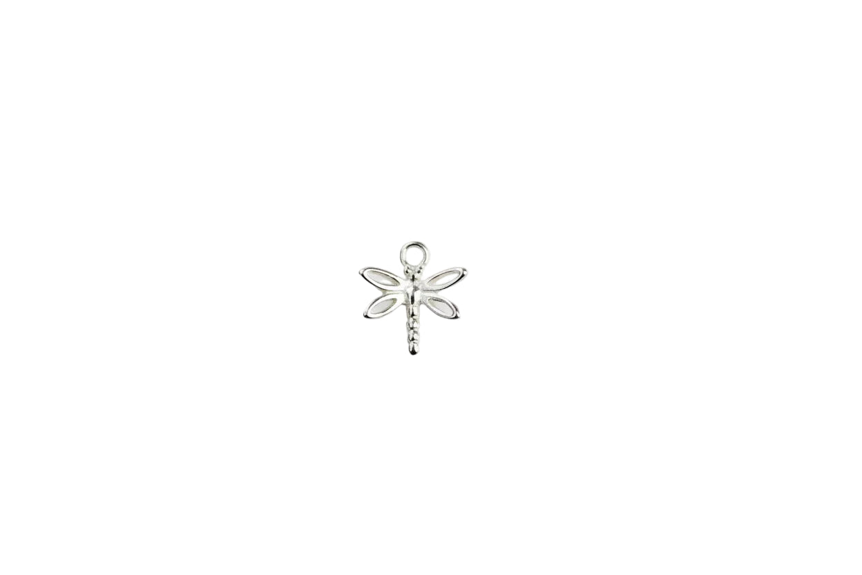 Silver dragonfly pendant on a marble background