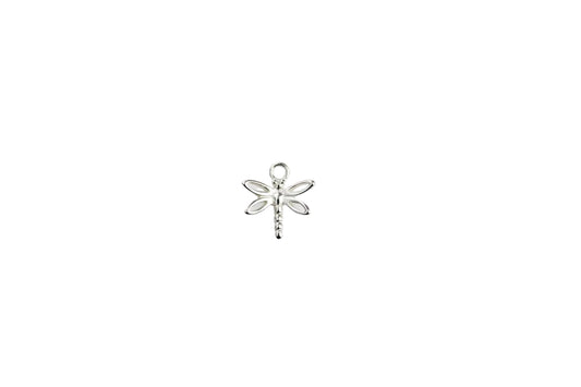 Silver dragonfly pendant on a marble background