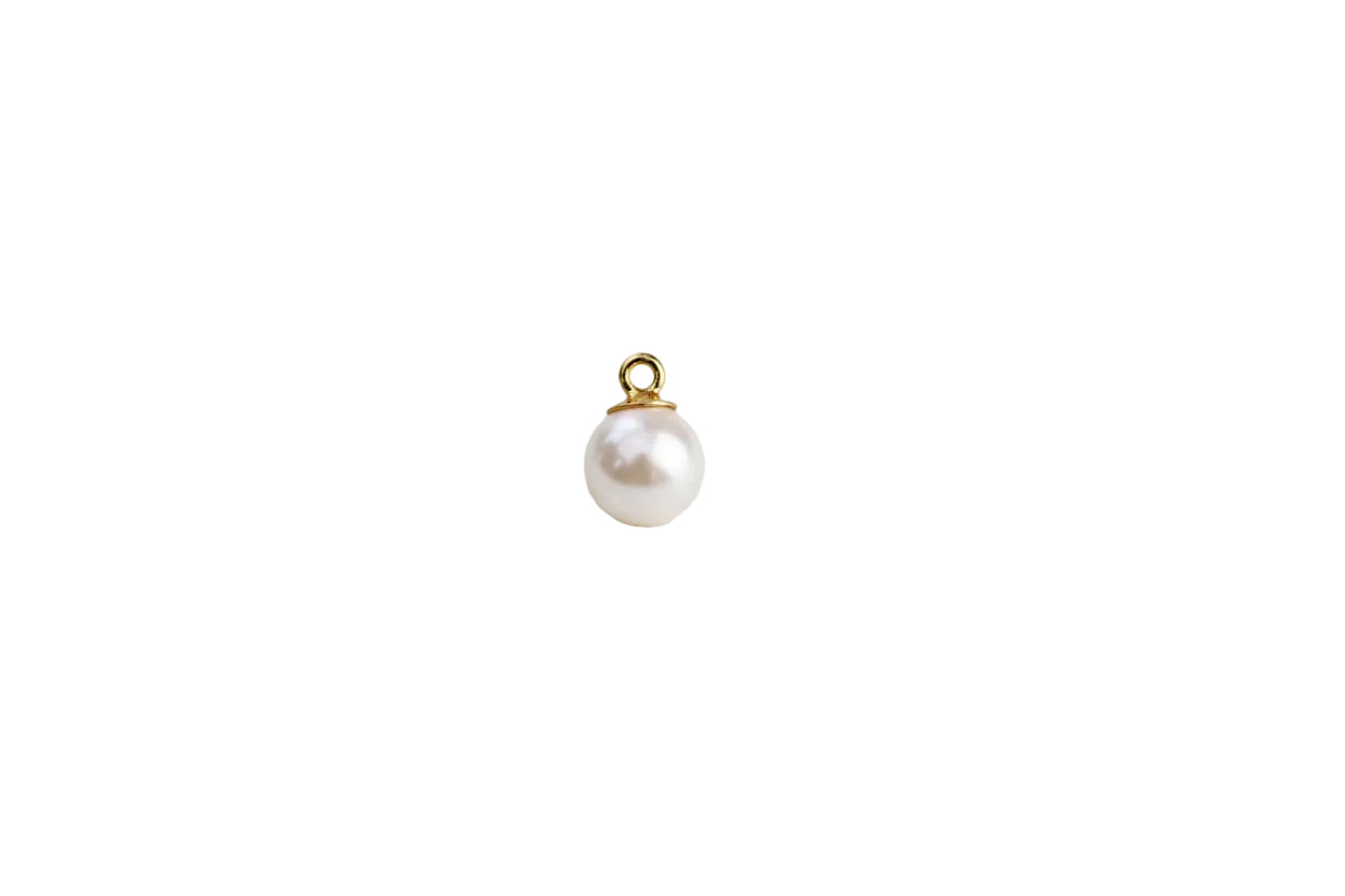 pearl on a white surface