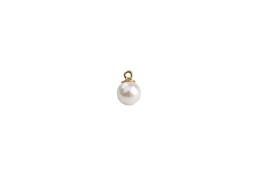 pearl on a white surface