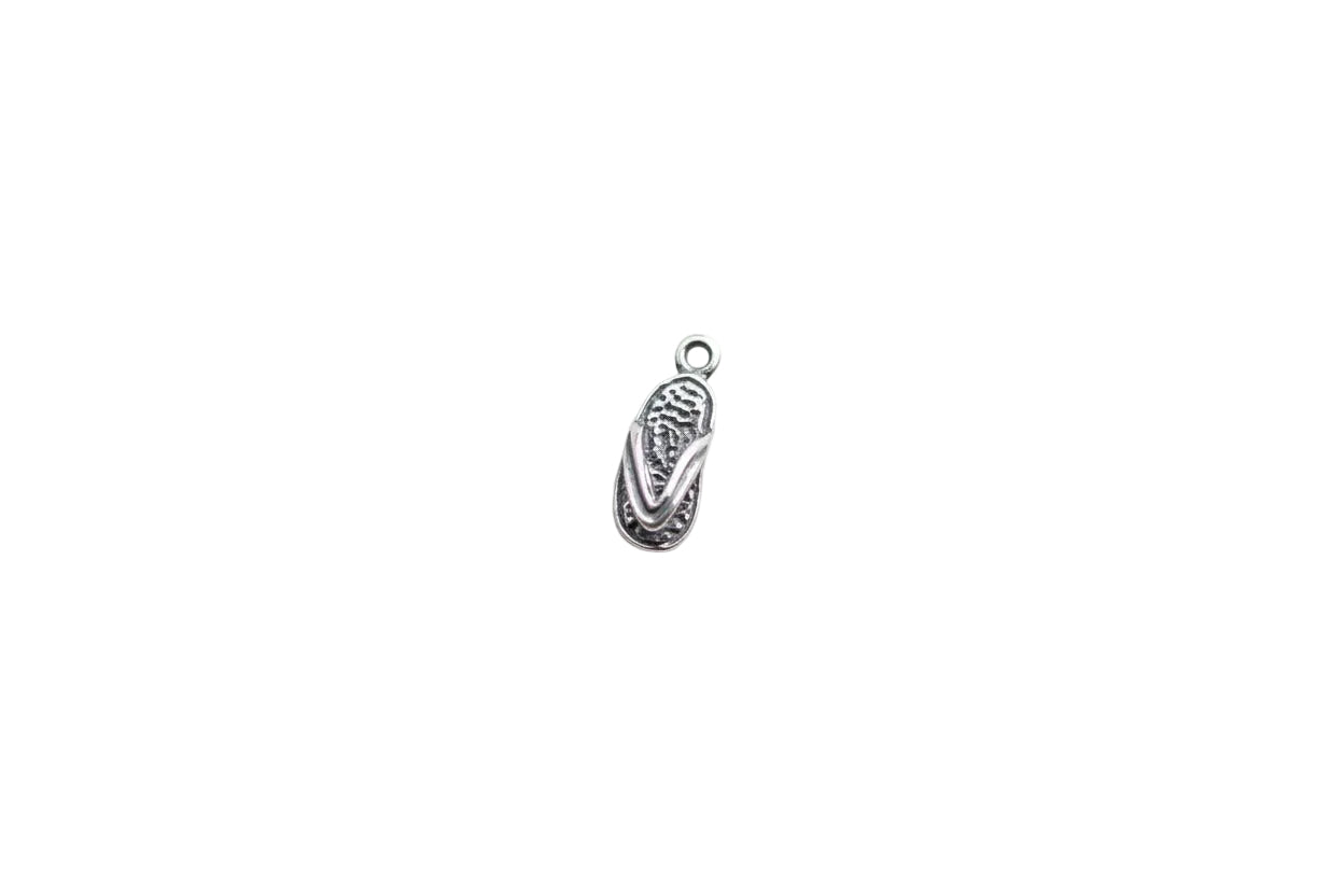 flip flop charm on a white surface