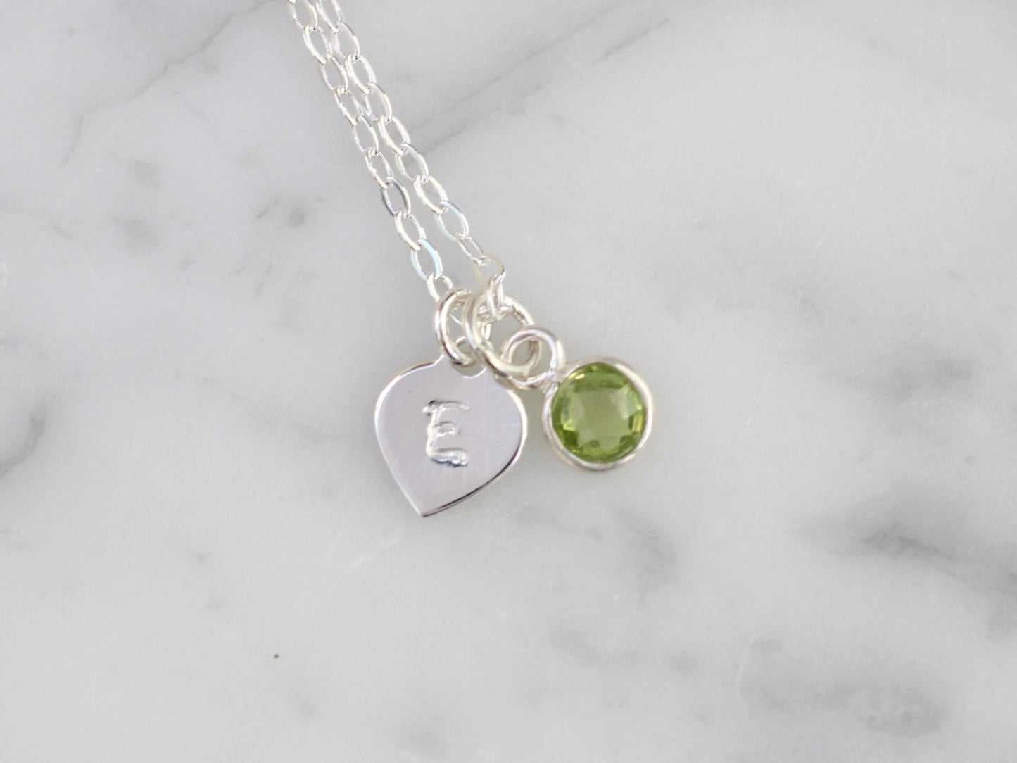 initial and peridot charm necklace