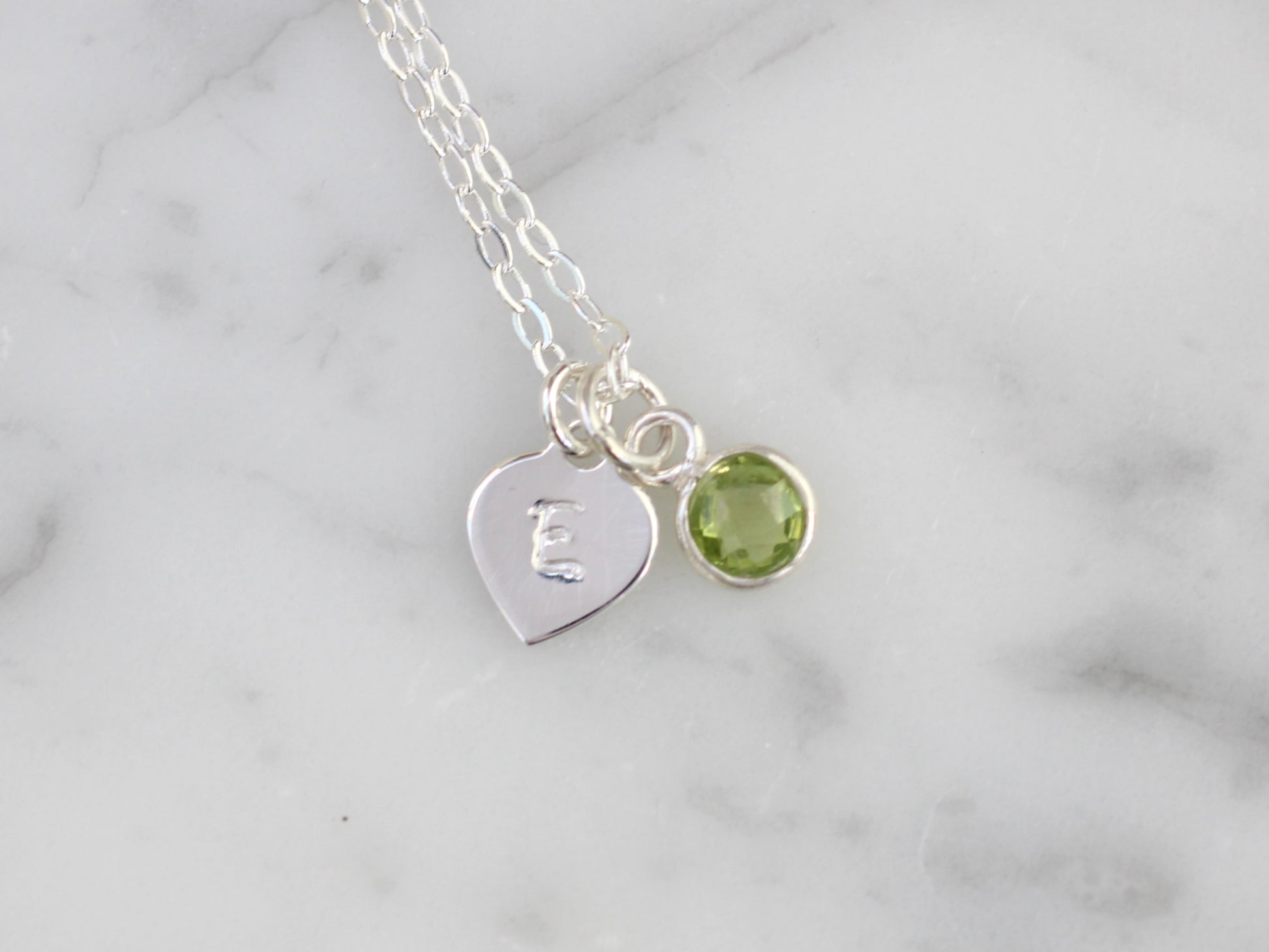 initial and peridot charm necklace