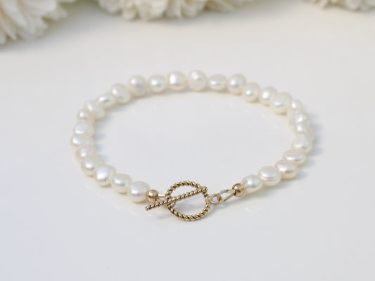 pearl bracelet with gold clasp