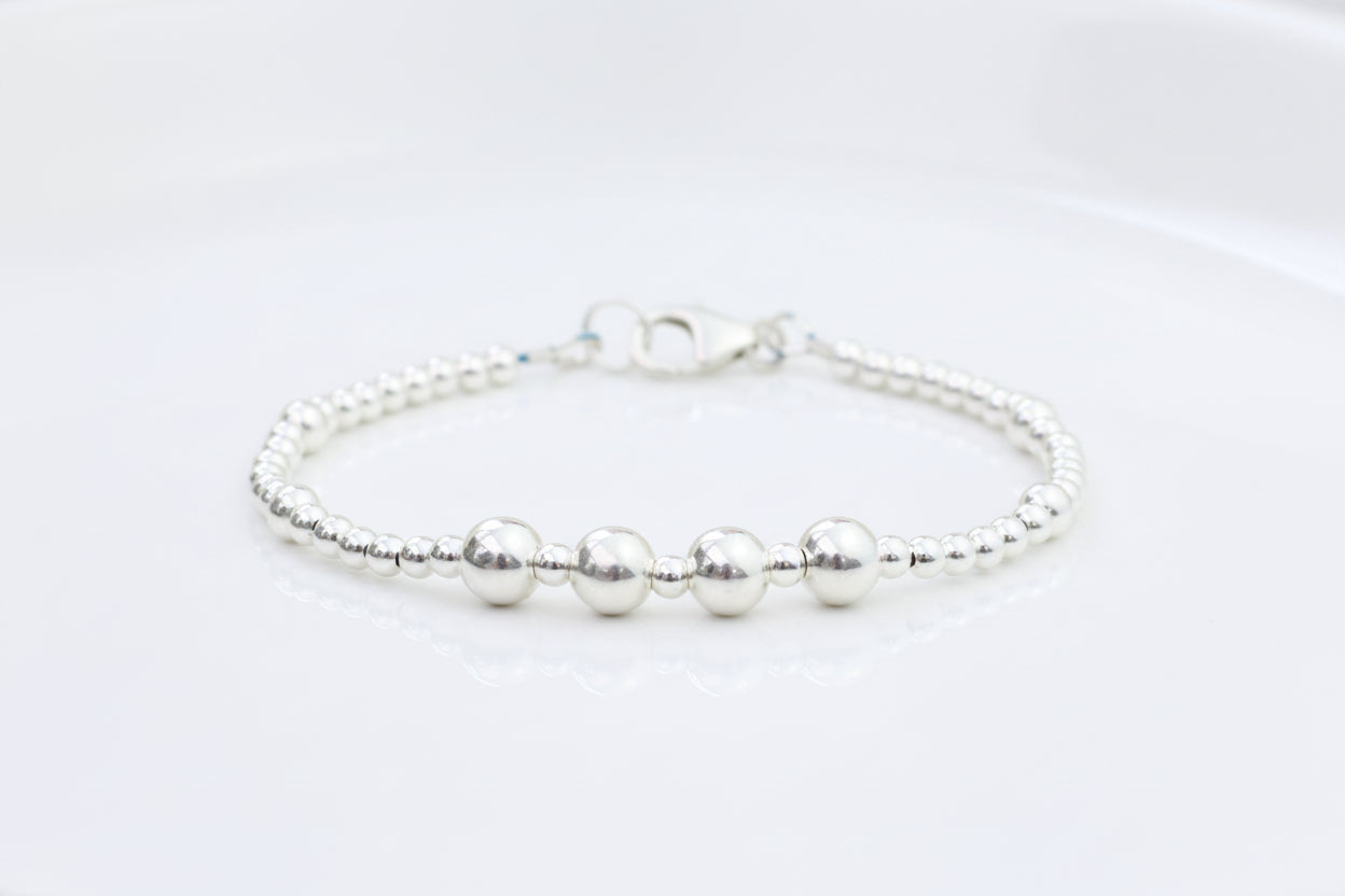 personalised 40th birthday bracelet with 1 bead representing 1 decade