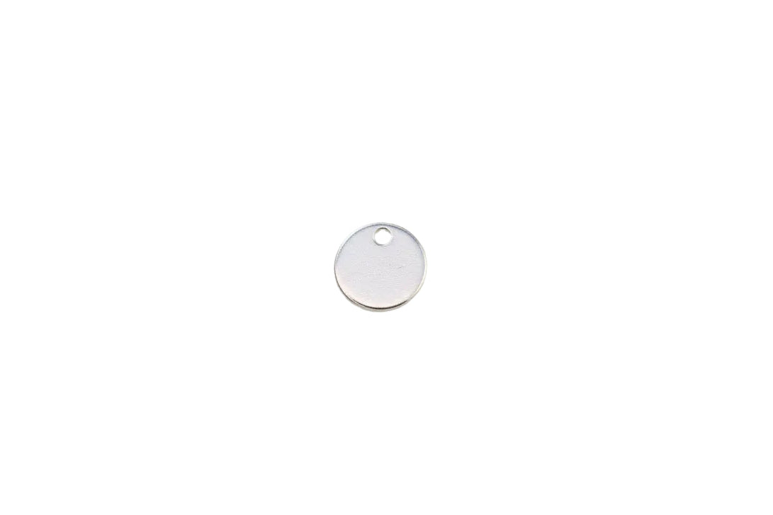 round tag on a white surface