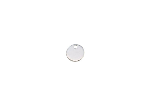 round tag on a white surface