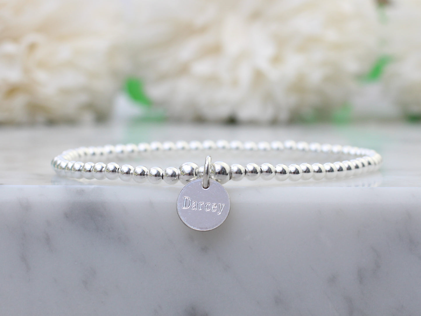 Personalised bead bracelet.
