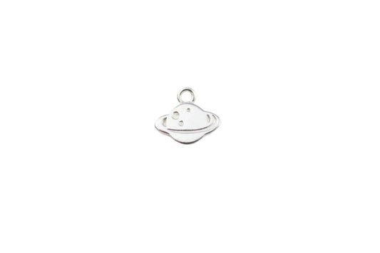 Silver planet charm on a light gray background