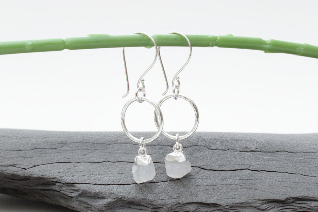 Silver earrings with raw moonstone charms