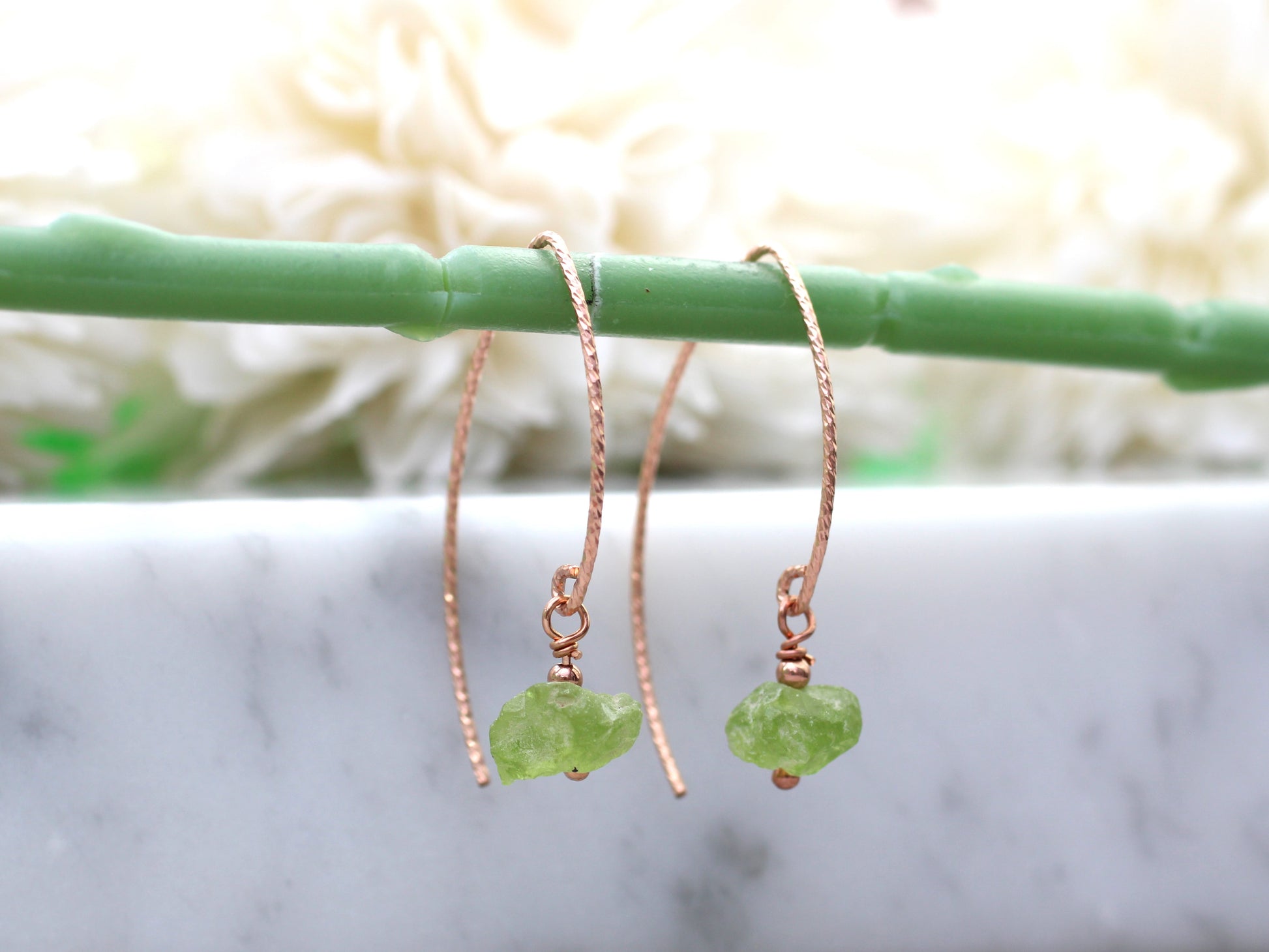 raw peridot earrings