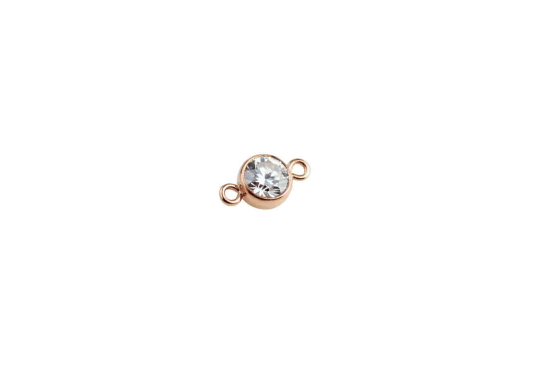 rose gold connector on a white surface