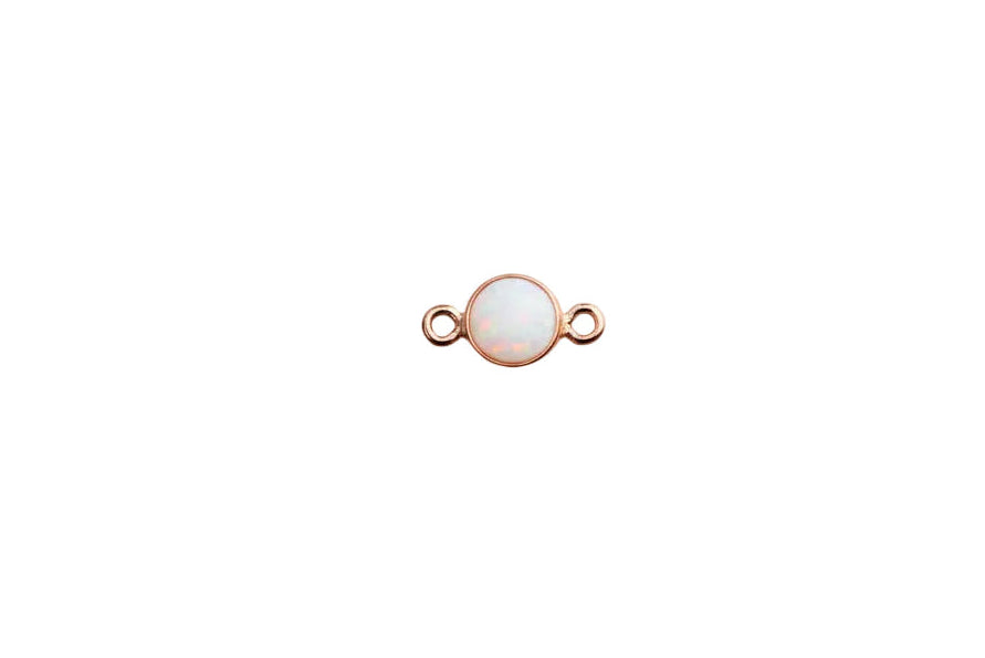 rose gold opal connector on a white surface