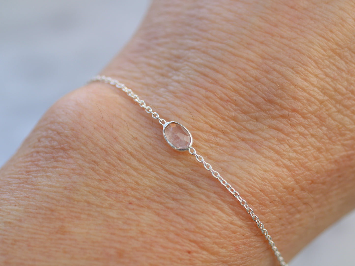 pink gemstone bracelet work on a wrist