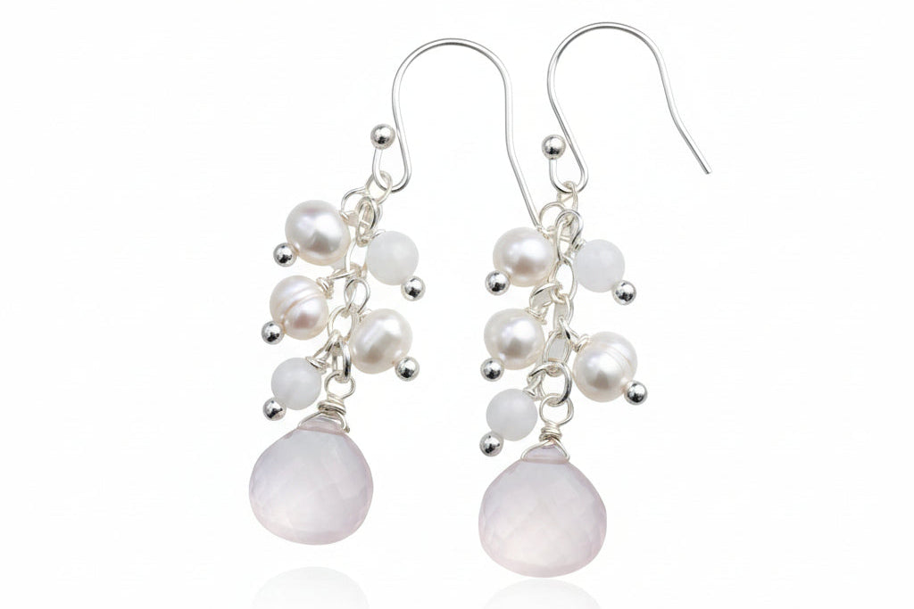 cluster earrings on a white background