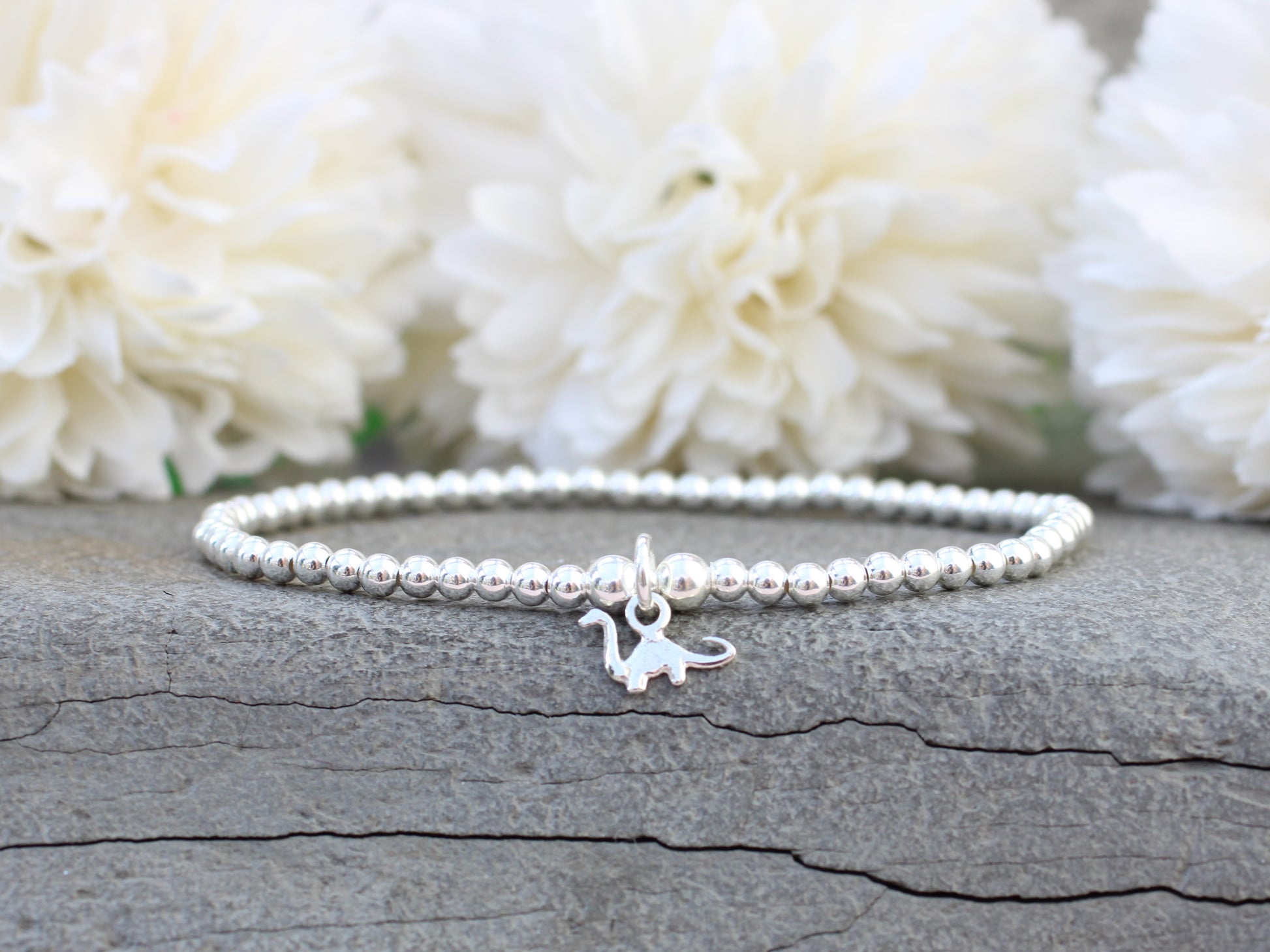 silver dinosaur bracelet