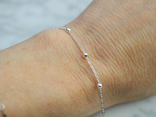 bead chain on a wrist