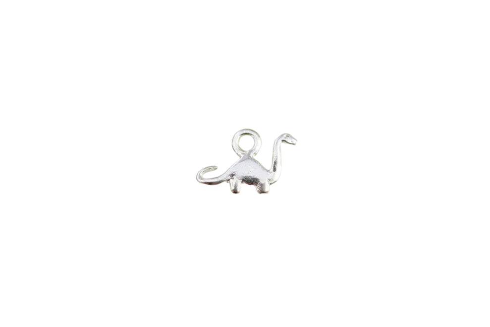 Silver dinosaur pendant on a light gray background