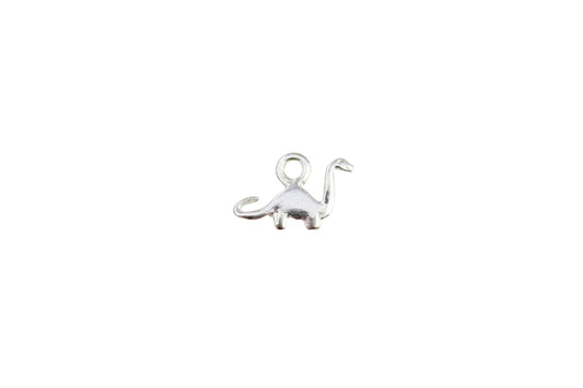 Silver dinosaur pendant on a light gray background