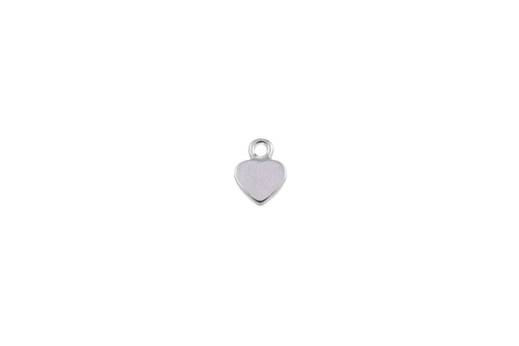 Silver heart-shaped pendant on a white background
