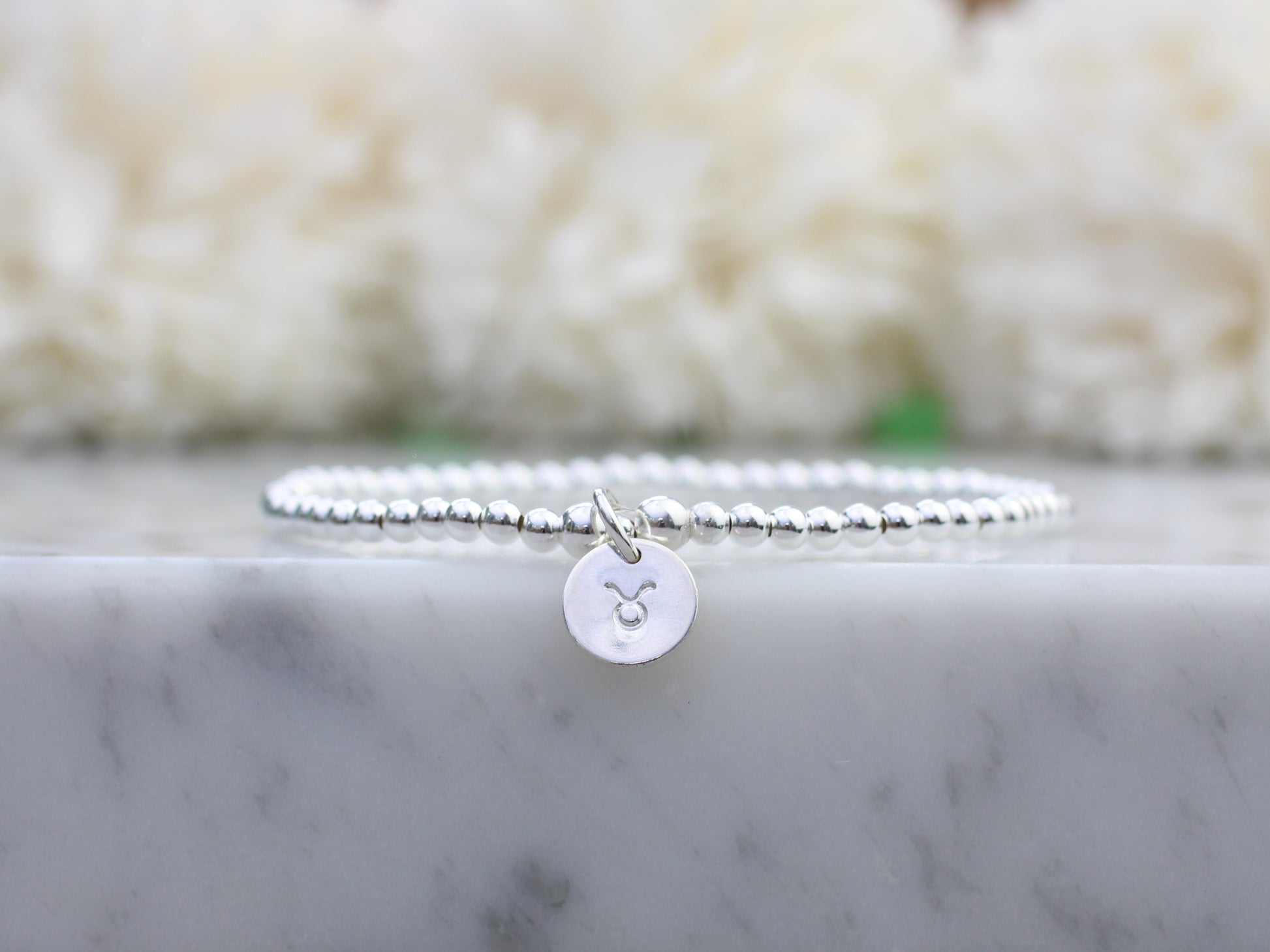 zodiac charm bracelet