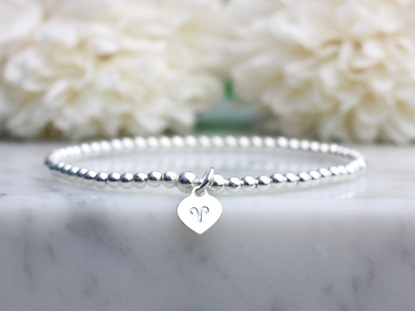 Zodiac bracelet in sterling silver. Zodiac sign bracelet. Sterling silver bead bracelet.