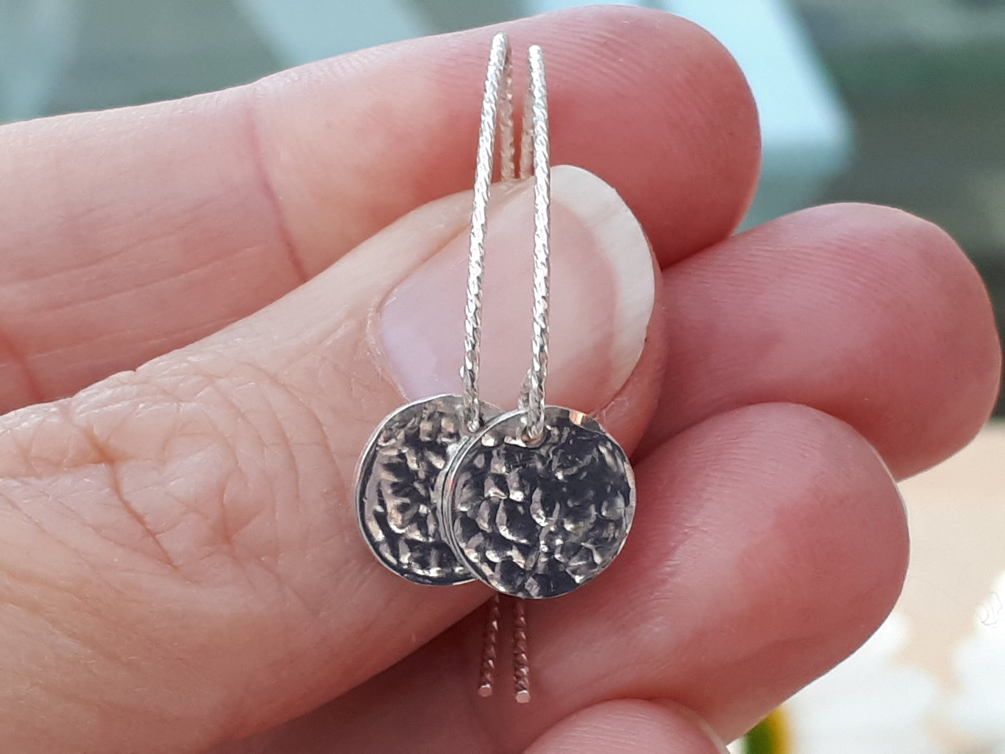 Hammered disc earrings in silver, gold and rose gold.